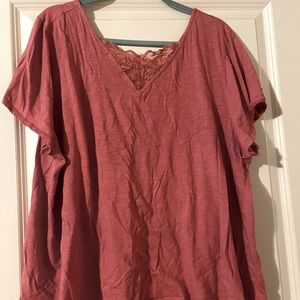 Coral lace V-neck blouse.